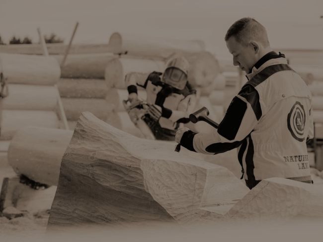 Maßanfertigung Baumstämme für Blockhausbau